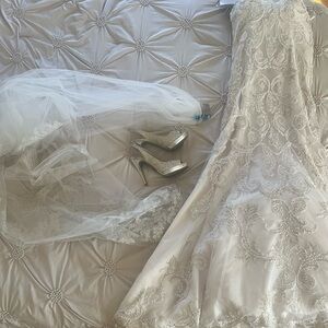 Elegant Cream Wedding Dress with Veil and Heels
